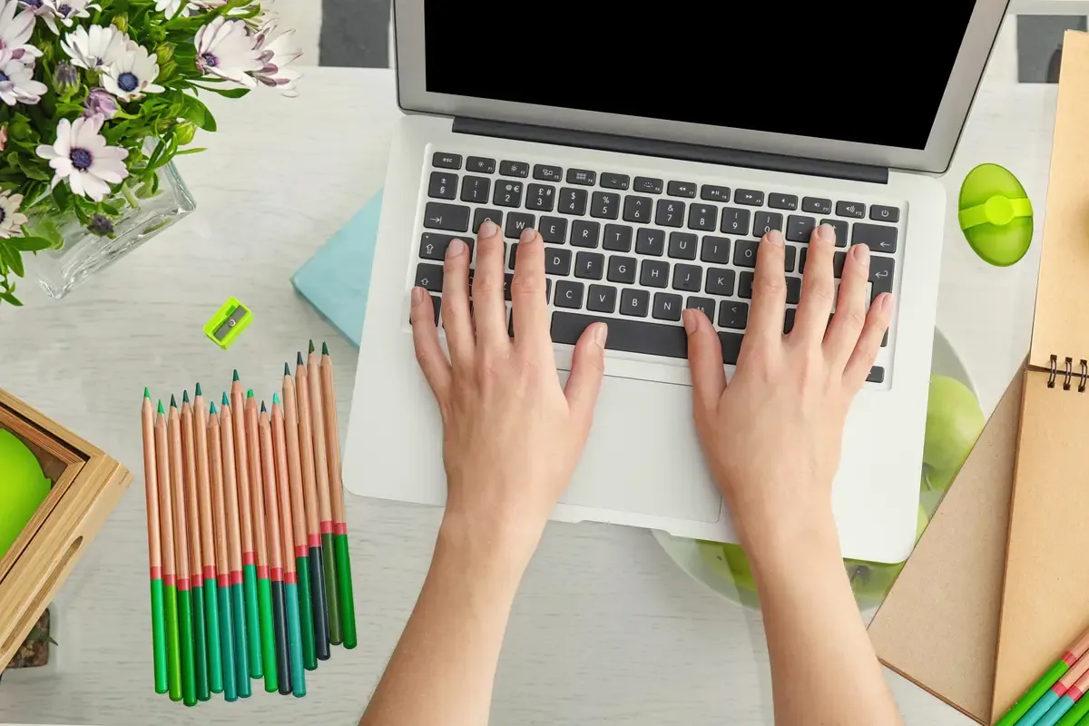 Woman working with laptop at table